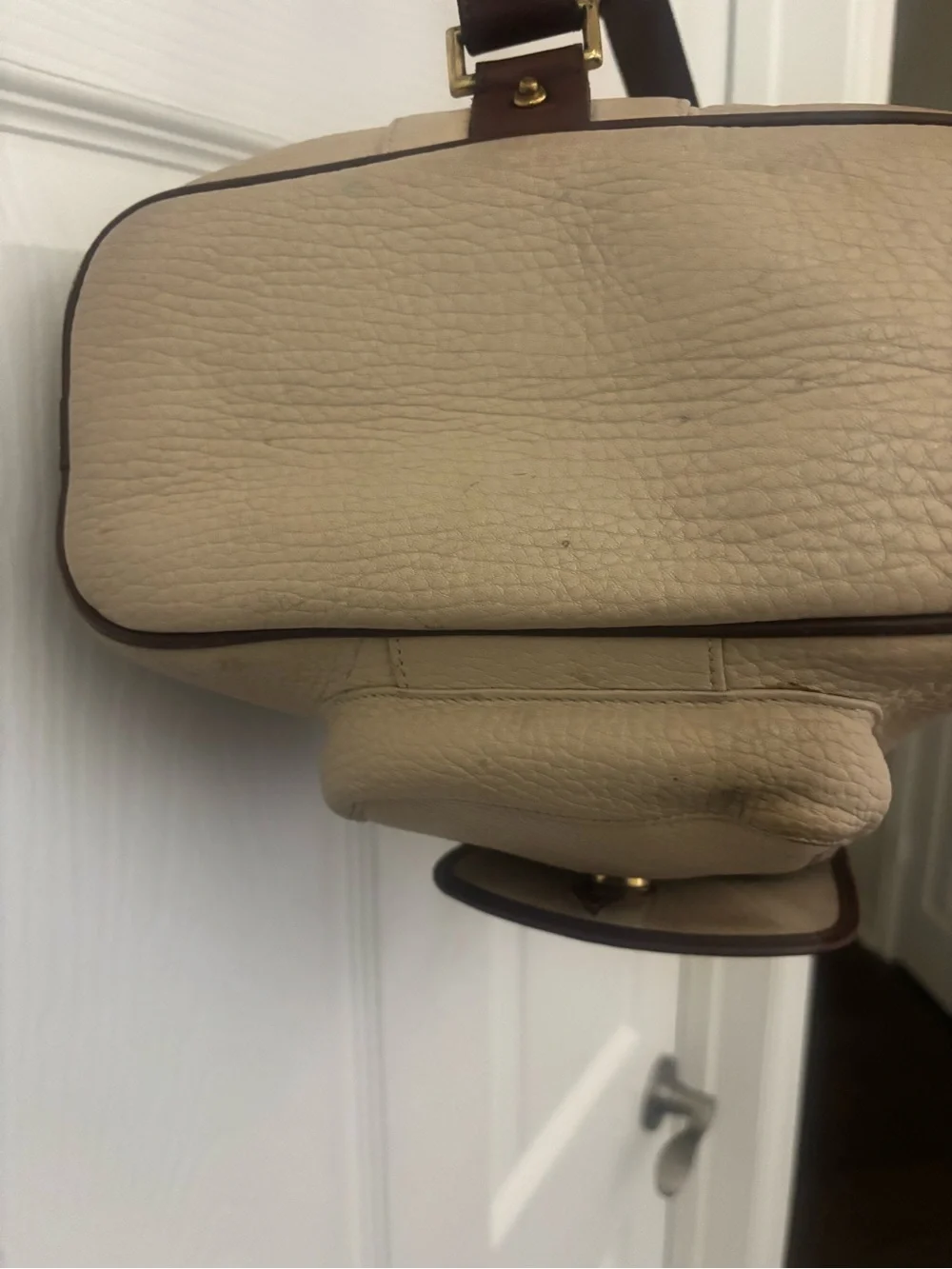 Dooney & Bourke Beige and Brown Leather Drawstring Bucket Backpack